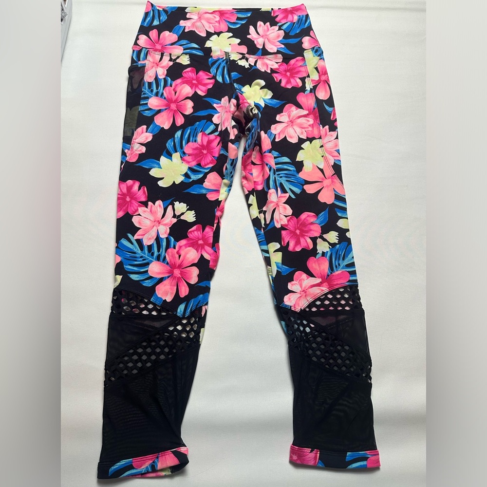PINK tropical floral print leggings with sheer fishnet bottom. Size M